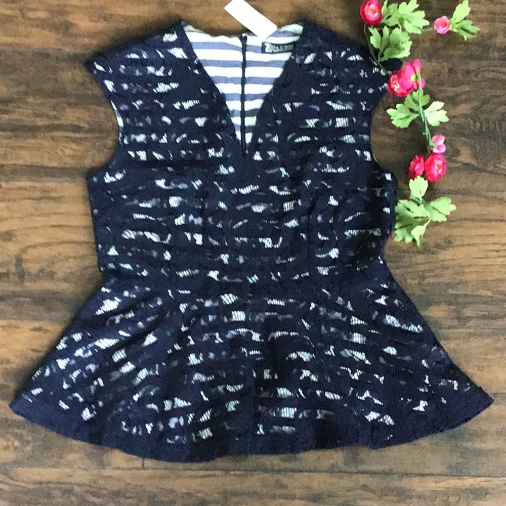 Navy blue and white lace peplum top